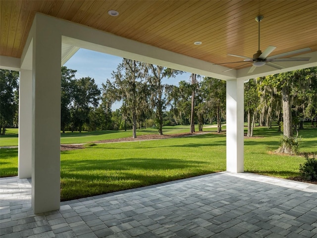 view of patio featuring ceiling fan