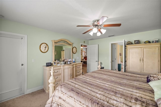 3967 SE 99th St, Belleview, FL 34420 - bedroom featuring visible vents, light colored carpet, baseboards, and a ceiling fan