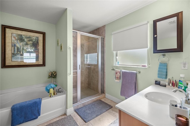 bathroom featuring tile patterned flooring, shower with separate bathtub, and vanity