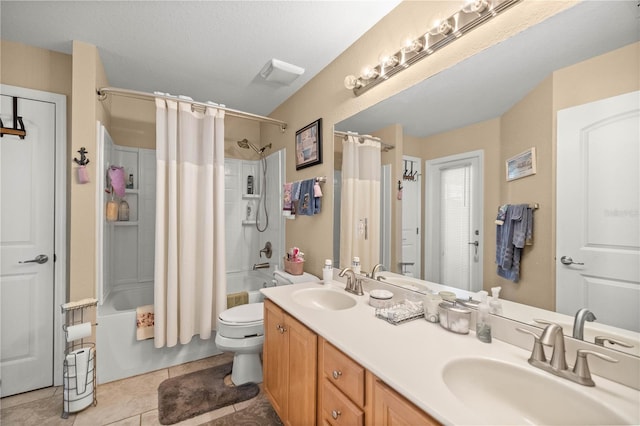 full bathroom with vanity, tile patterned flooring, toilet, shower / bathtub combination with curtain, and a textured ceiling