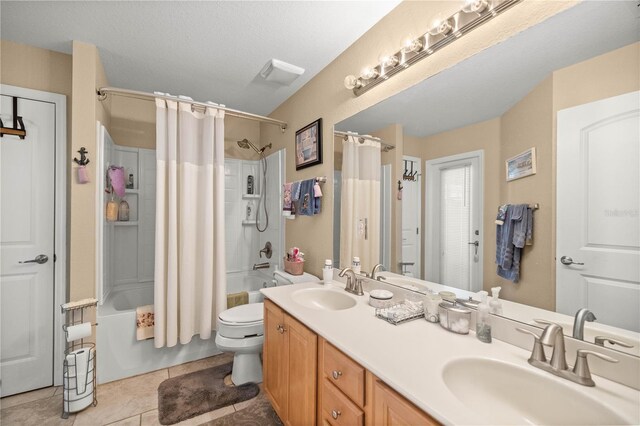 3967 SE 99th St, Belleview, FL 34420 - bathroom featuring tile patterned floors, toilet, shower / bath combo, and a sink