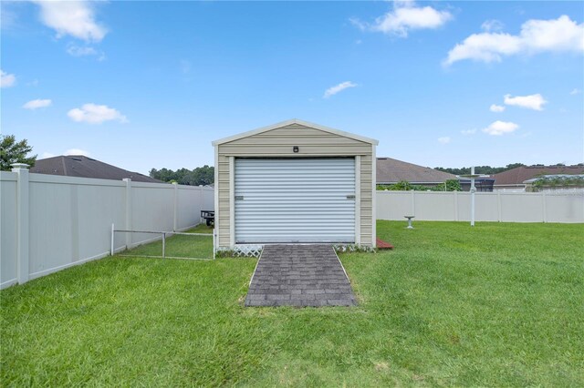 garage with a lawn