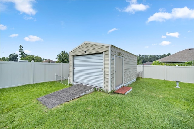 view of outbuilding featuring a yard