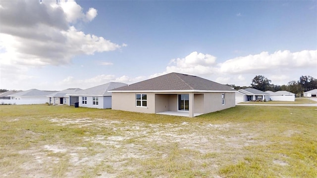 rear view of property with a patio