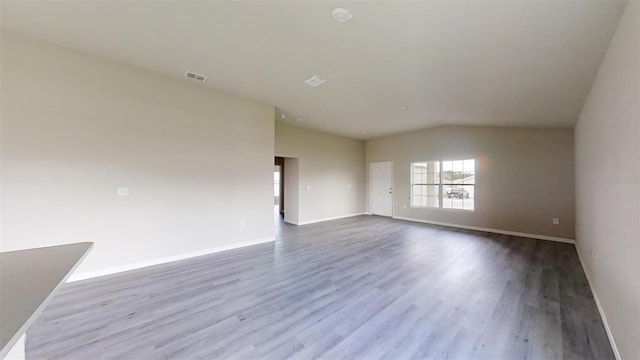 unfurnished room with light hardwood / wood-style flooring