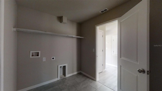 laundry area with tile patterned flooring, electric dryer hookup, and hookup for a washing machine