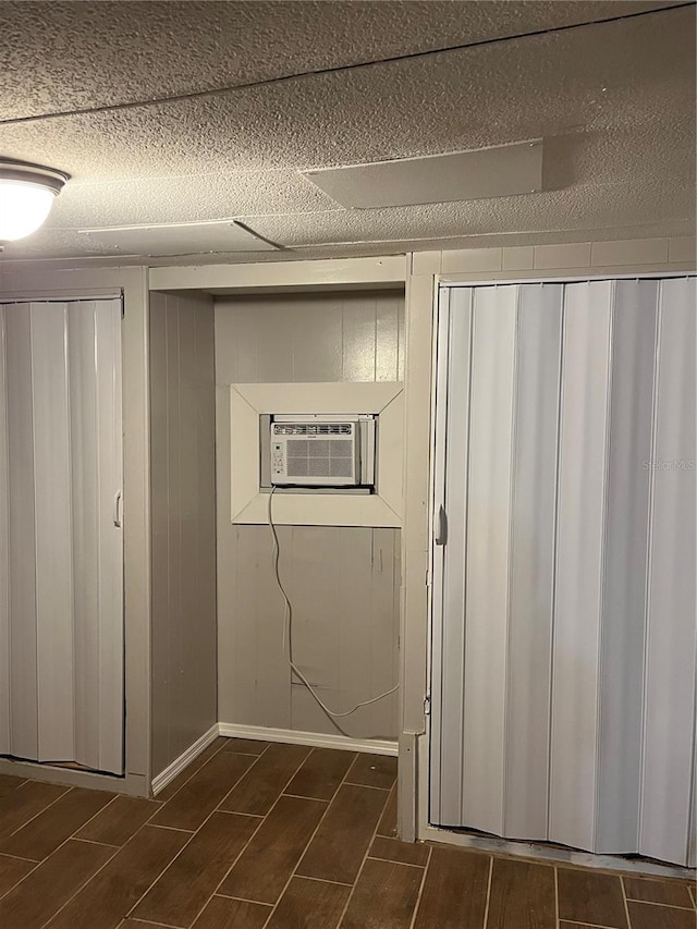 closet featuring a wall mounted air conditioner