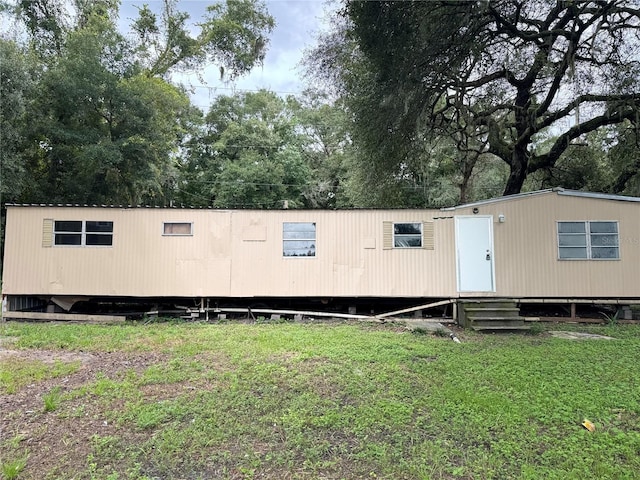 view of front of home with a front yard