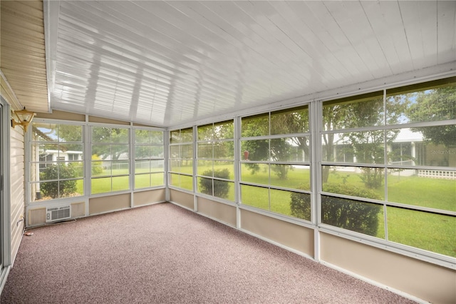 unfurnished sunroom with plenty of natural light and lofted ceiling