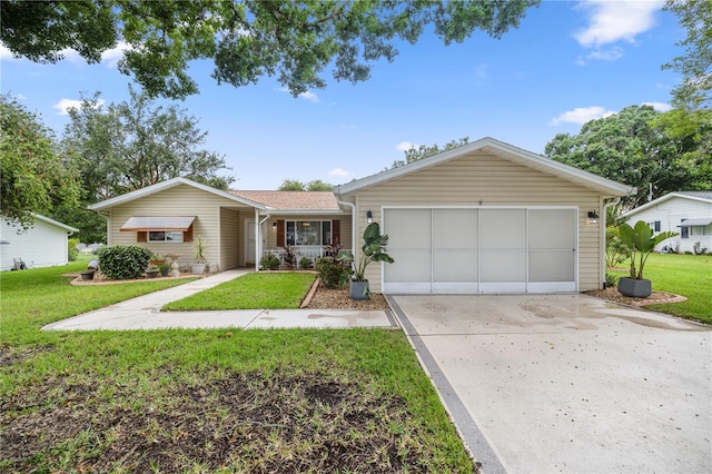 ranch-style house with a garage and a front yard