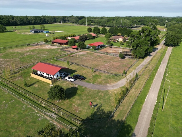 birds eye view of property featuring a rural view