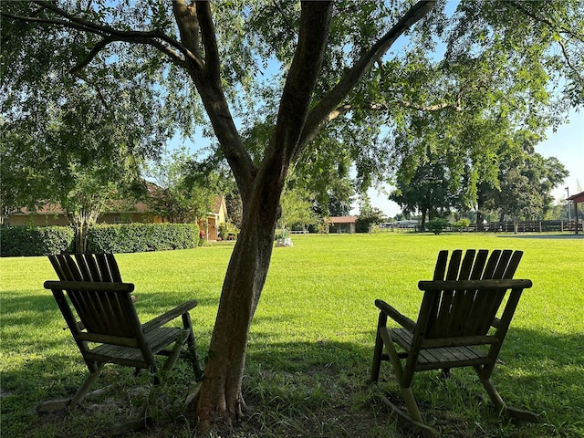 surrounding community featuring a lawn