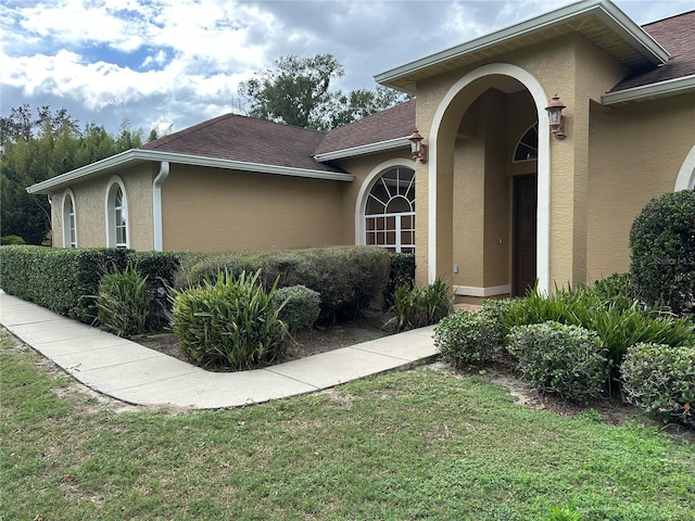 exterior space featuring a lawn