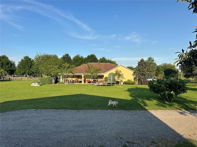 exterior space featuring a lawn