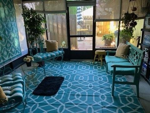 sunroom featuring plenty of natural light