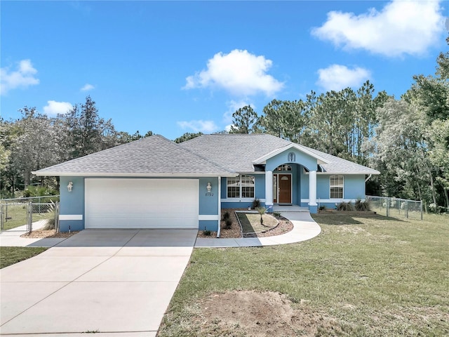 single story home featuring concrete driveway, fence, a front lawn, and stucco siding