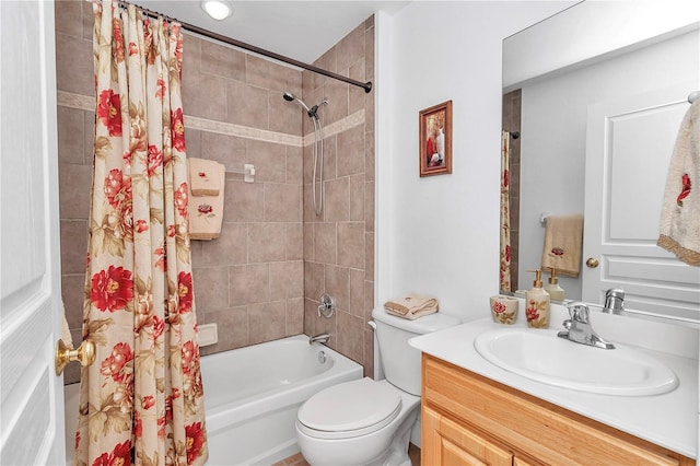 bathroom with toilet, shower / bath combo, and vanity