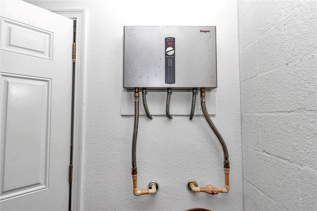 interior details featuring tankless water heater