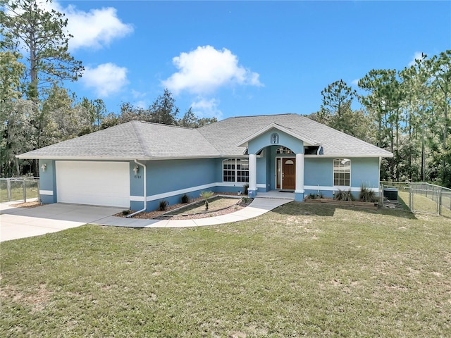 single story home with a front yard, driveway, fence, and stucco siding