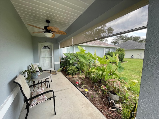 view of patio / terrace featuring ceiling fan