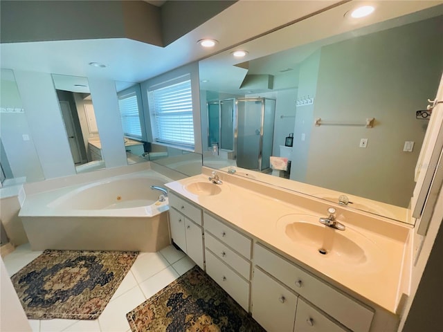 bathroom featuring vanity, separate shower and tub, and tile patterned floors