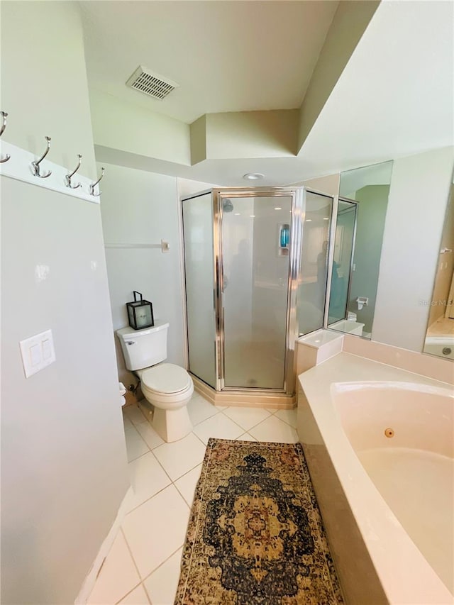 bathroom with toilet, plus walk in shower, and tile patterned floors