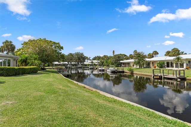 view of water feature with a dock