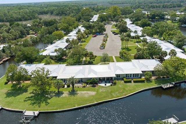 birds eye view of property featuring a water view and a residential view