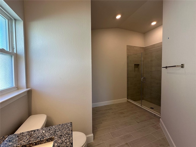 full bathroom with toilet, recessed lighting, vanity, baseboards, and a shower stall