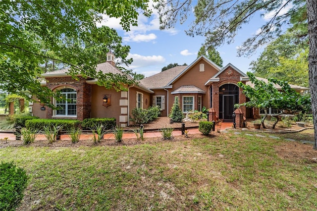 view of front of property with a front yard