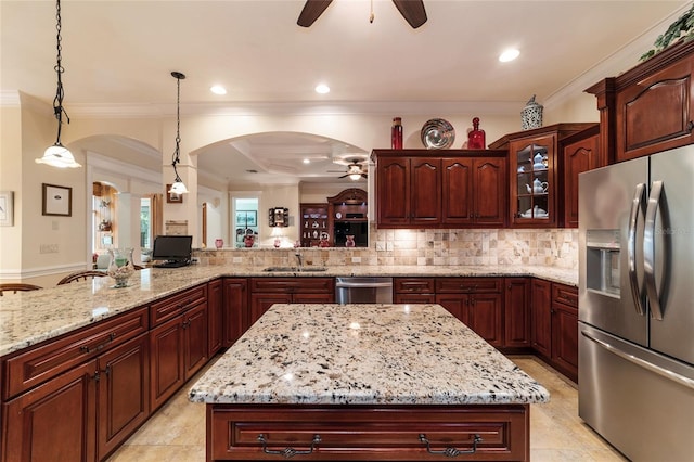 kitchen with ceiling fan, backsplash, appliances with stainless steel finishes, and light tile patterned floors