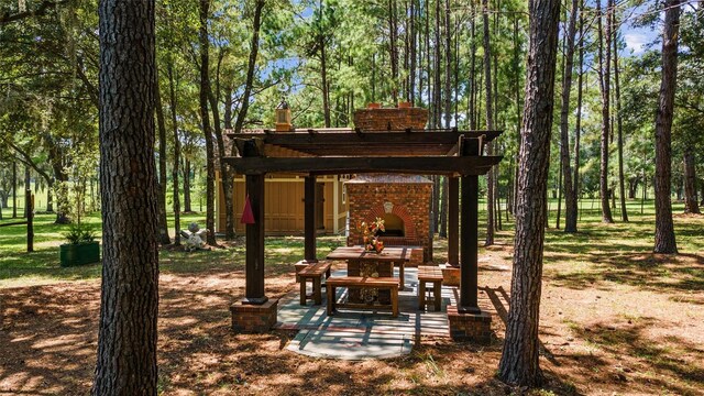 surrounding community featuring a pergola and a patio