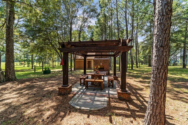 exterior space featuring a pergola and a patio area