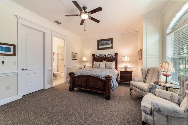 bedroom featuring carpet floors, ceiling fan, ornamental molding, and ensuite bath