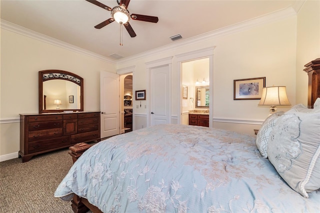 bedroom featuring ceiling fan, ensuite bathroom, carpet, and ornamental molding