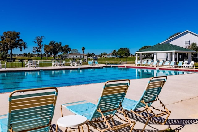 view of pool featuring a gazebo, a yard, and a patio area