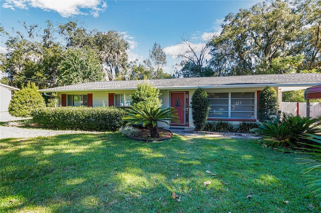 ranch-style house with a front yard