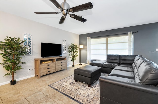 tiled living room featuring ceiling fan