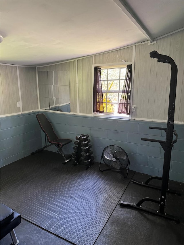 exercise room featuring concrete floors