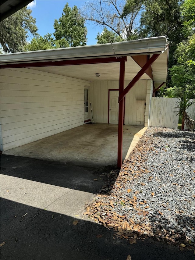 view of parking with a carport