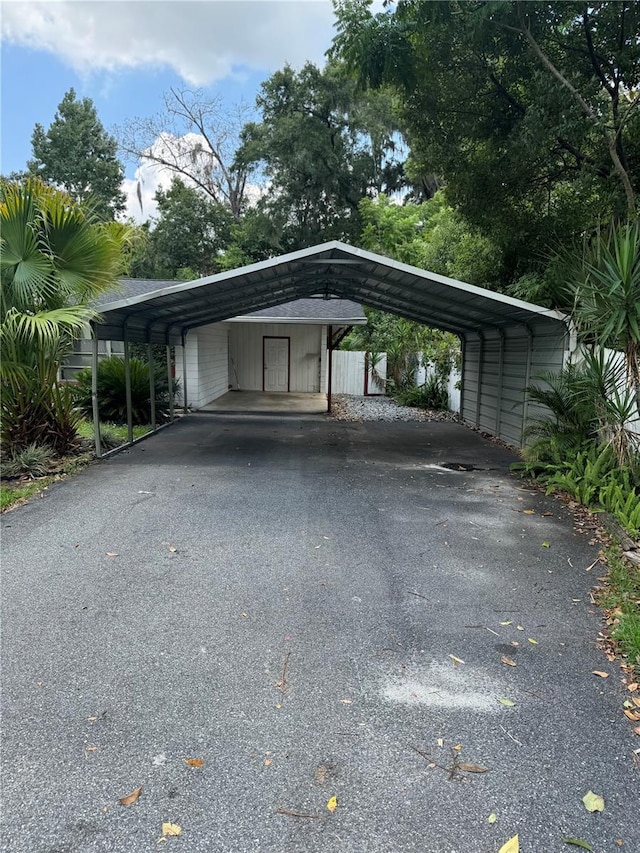 view of car parking with a carport