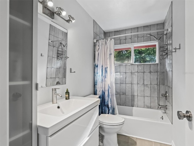 full bathroom featuring tile patterned flooring, vanity, shower / bath combo, and toilet