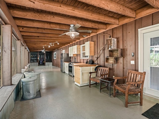 interior space featuring ceiling fan