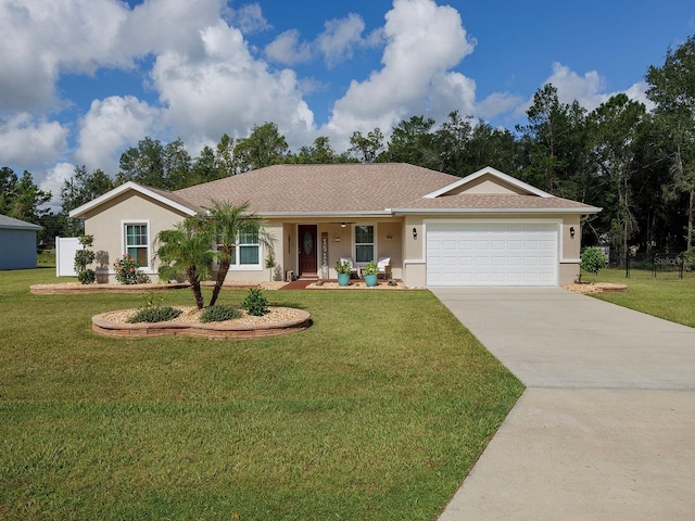 single story home featuring a garage and a front lawn