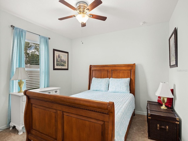 bedroom featuring ceiling fan and carpet floors