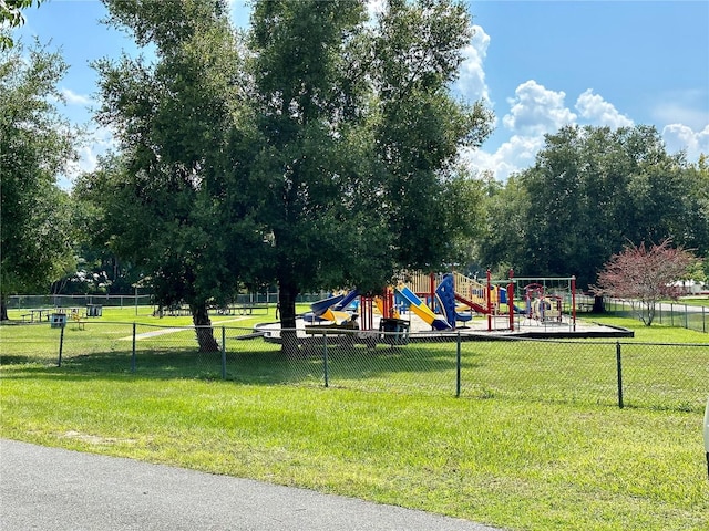 view of play area with a yard