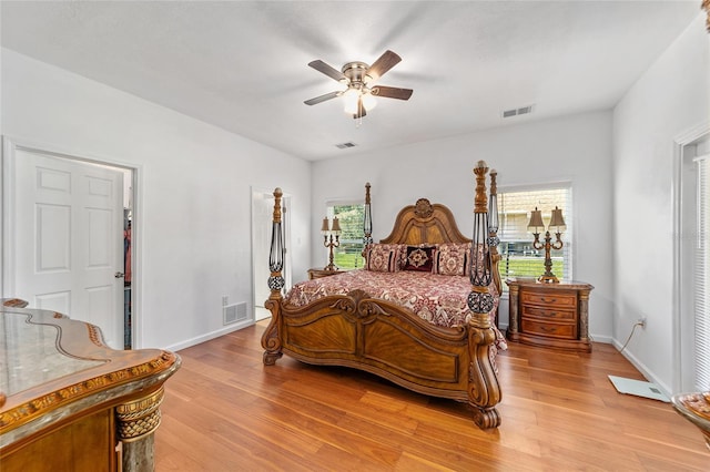 bedroom featuring visible vents and light wood-style floors