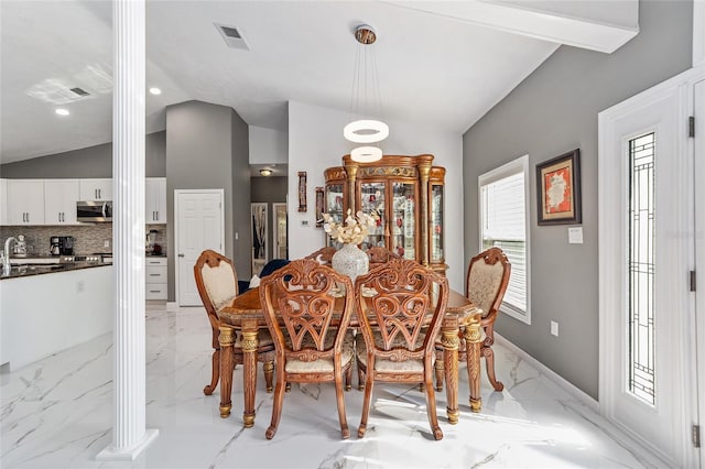 dining space with recessed lighting, visible vents, vaulted ceiling, marble finish floor, and ornate columns