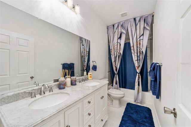 bathroom with toilet, shower / bathtub combination with curtain, visible vents, and a sink