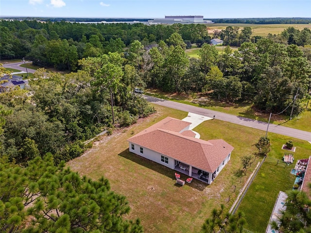 bird's eye view featuring a view of trees